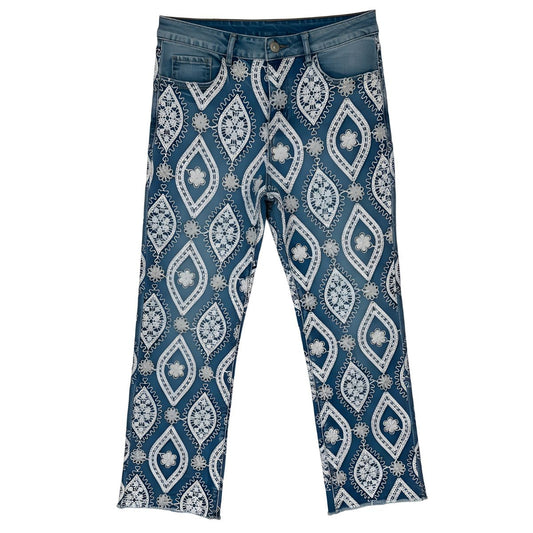 Jean azul con bordados de flores blancas - diseño exclusivo Ana Lince